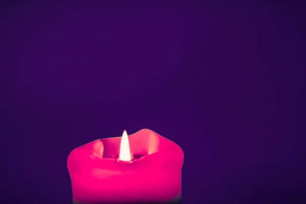 Pink holiday candle on purple background, luxury branding design — Stock Photo, Image