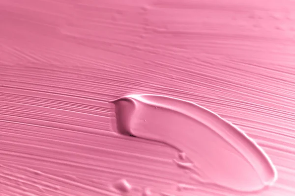 Cosmétiques fond texturé abstrait, pinceau acrylique rose — Photo