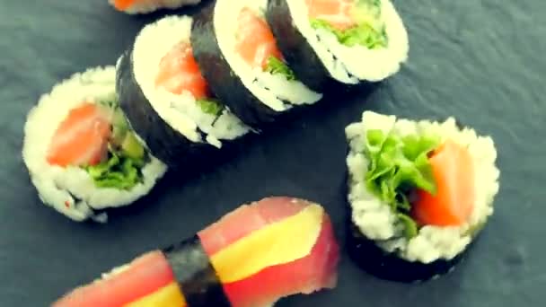 Japanese sushi rolls in a restaurant at lunch time, asian cuisine delivery — Stock Video