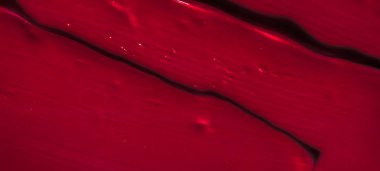 Kırmızı kozmetik doku arka planı, makyaj ve cilt estetiği 