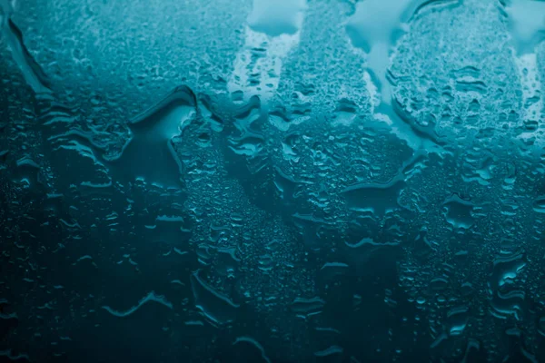 Textura da água fundo abstrato, gotas de água em vidro turquesa — Fotografia de Stock