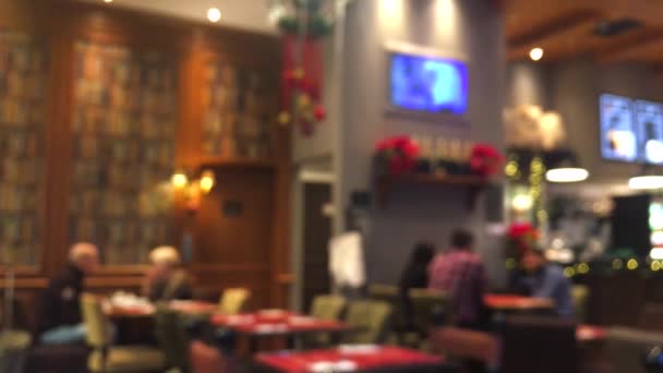 Bulanık odaklı kafe, kafeterya veya restoranın iç planı, soyut dijital arkaplan, boş zaman ve seyahat markası tasarımı için bulanık bokeh, tatil sezonu vlog — Stok video