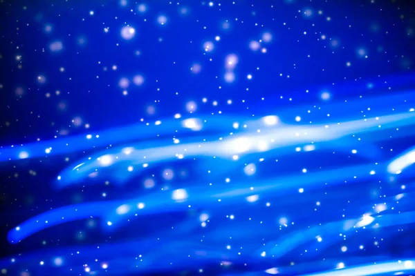 Winter holiday abstract background, glowing snow and magic spark — Stock Photo, Image