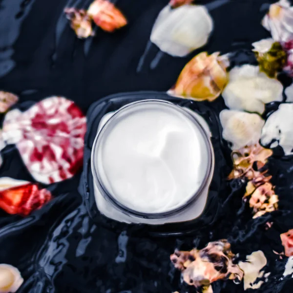 Sensitive skincare moisturizer beauty face cream on water and se — Stock Photo, Image