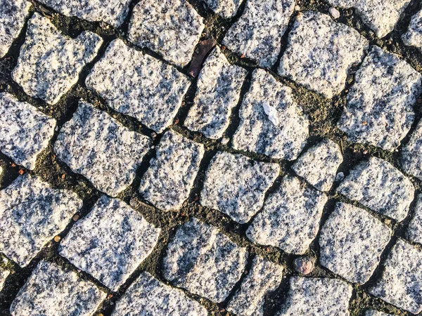 Velho pavimento de pedra rústica fundo texturizado, det arquitectónico — Fotografia de Stock