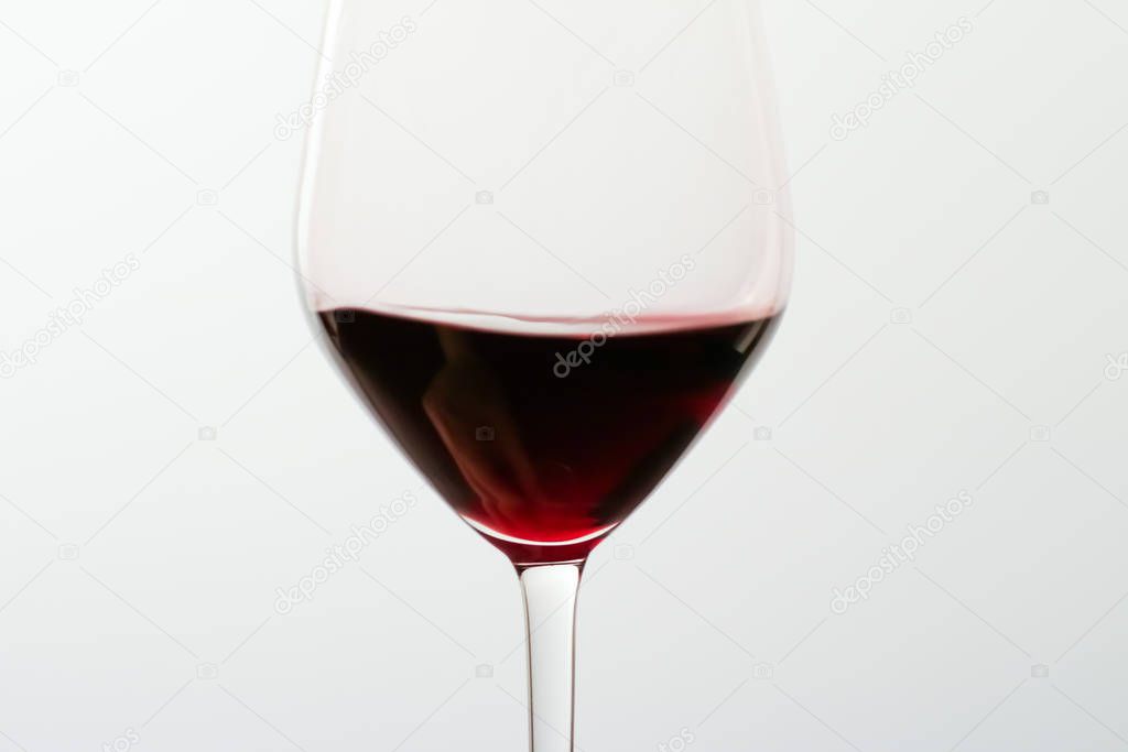 Glass of red wine, pouring drink at luxury holiday tasting event