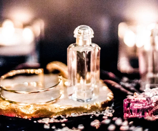 Perfume bottles and vintage fragrance at night, aroma scent, fra — Stock Photo, Image