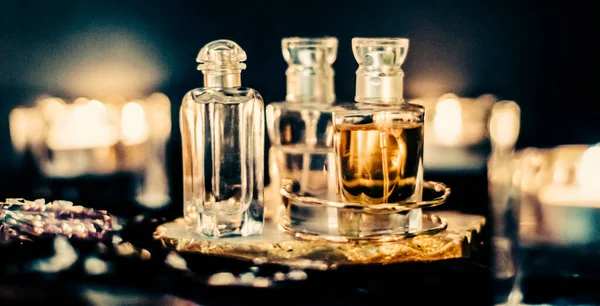 Perfume bottles and vintage fragrance at night, aroma scent, fra — Stock Photo, Image