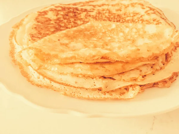 Authentic food, thin homemade pancakes on marble table backgroun — Stock Photo, Image