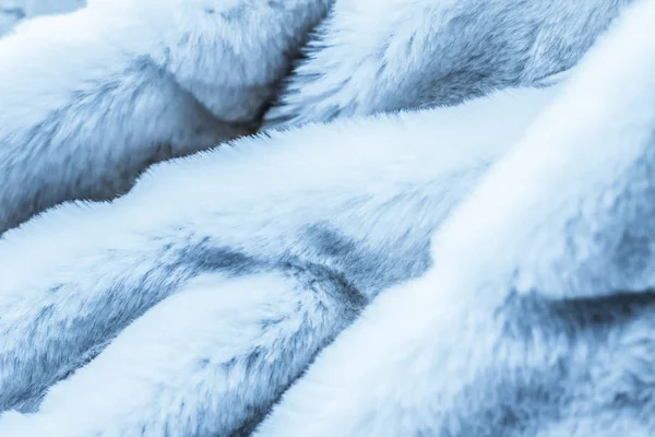 Luxury blue fur coat texture background, artificial fabric detai