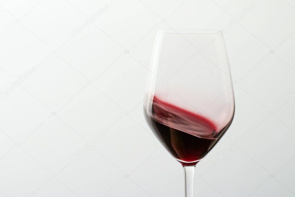 Glass of red wine at tasting event, quality control and alcoholic drinks