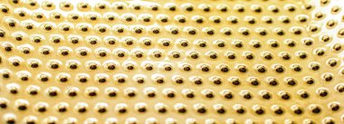 Arkaplan, malzeme ve iç tasarım olarak altın metalik yüzey dokusu