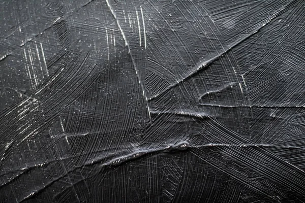 深灰色背景，木炭涂料纹理为抽象背景 — 图库照片