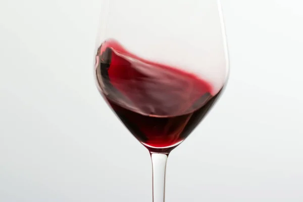 Glass of red wine at tasting event, quality control and alcoholic drinks — Stock fotografie