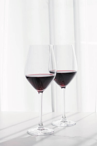 Two glasses of red wine, organic beverage product