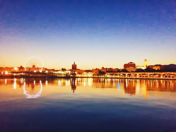 Utsikt över hamnen i Malaga, huvudstaden i Andalusien regionen i Spanien vid solnedgången — Stockfoto