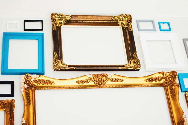 Empty art frames on gallery wall, decor and design