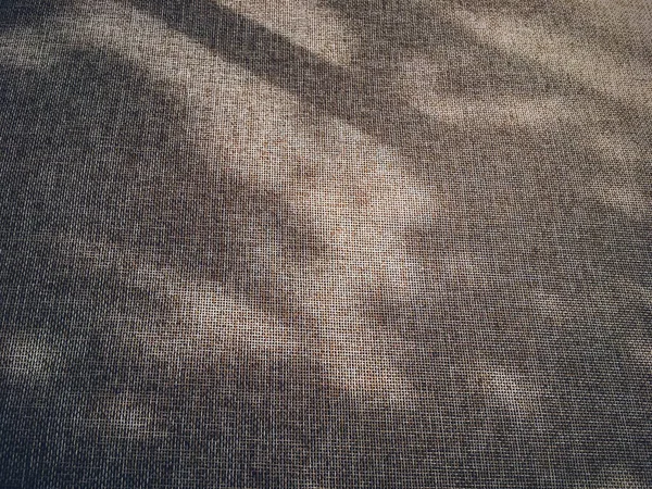 Linen texture and shadows as rustic background — Stock Photo, Image