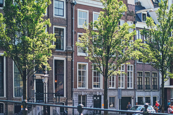 Main downtown street in the city center of Amsterdam in Netherlands