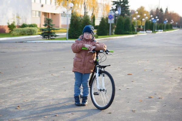 Boy is riding a bicycle — Stock Photo, Image
