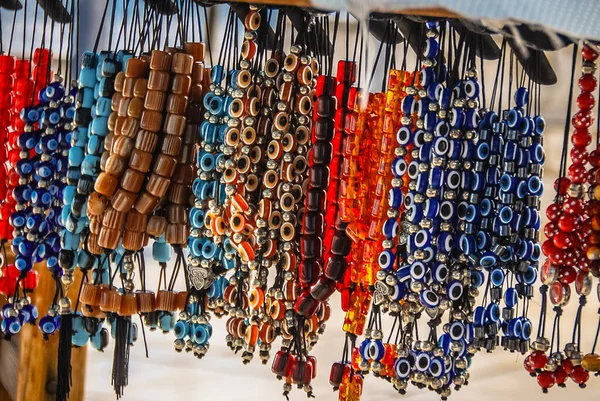Various multi-colored worry beads hanging for sale in Athens. — Stock Photo, Image