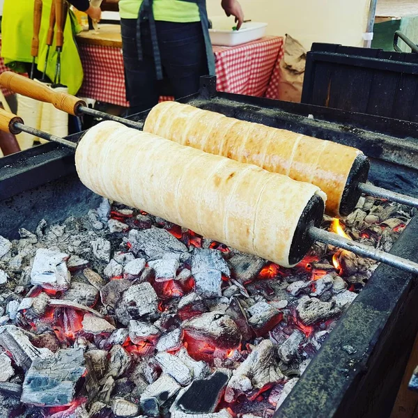 Hungarian Chimney Cakes Cooking over Coals