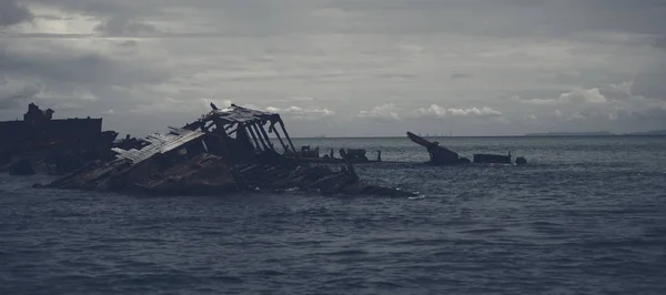 Dark and gloomy effect on the shipwrecks at Tangalooma Island — Stock Photo, Image