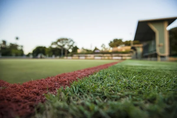 Green bowls lawn close up during the day.