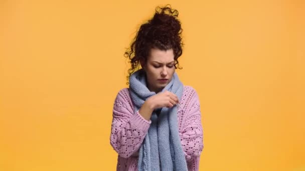 Sick Woman Looking Digital Thermometer Isolated Orange — Stock Video