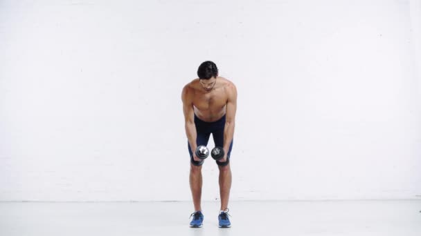 Sportsman Exercising Dumbbells White Background — Stock Video