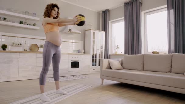 Pregnant Woman Doing Squats Ball Home — 비디오