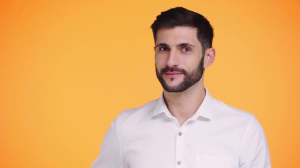 Rack Focus Man Holding Flowers Isolated Orange — 비디오