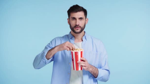Scared Man Popcorn Watching Movie Isolated Orange — 비디오