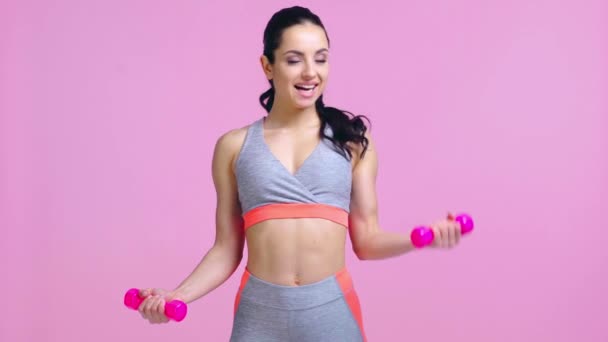 Sportswoman Working Out Dumbbells Isolated Pink — Stock Video