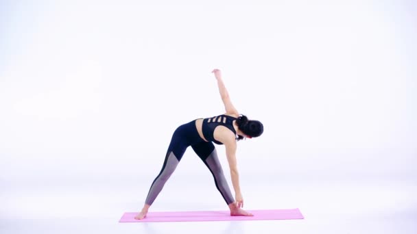 Sportive Girl Stretching Pink Fitness Mat White — Stock Video