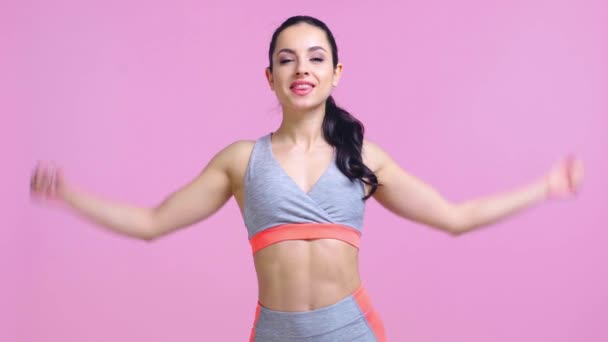 Happy Sportswoman Showing Muscles Isolated Pink — Stock Video