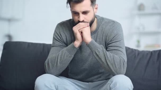 Worried Man Sitting Sofa Home — Stock Video