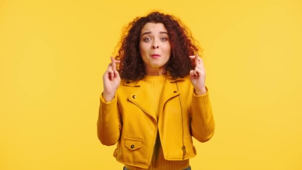 Excited Happy Girl Holding Crossed Fingers Gesturing Isolated Yellow — Stock Video