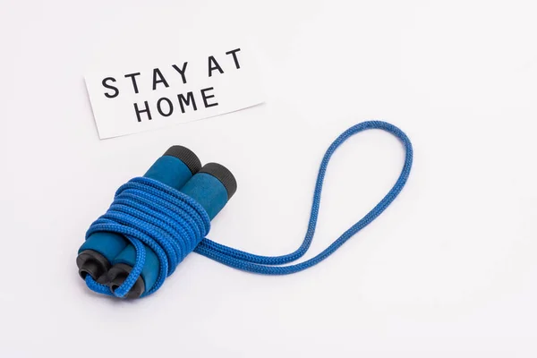Blue Skipping Rope Paper Stay Home Lettering White Copy Space — Stock Photo, Image