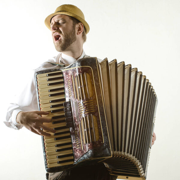Portrait of professional musician with accordion