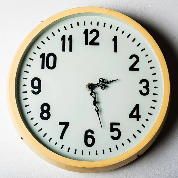 Old round station clock on the white wall — Stock Photo, Image