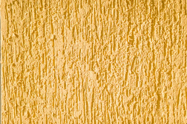 yellow background facade plaster. Exterior building structure backdrop.