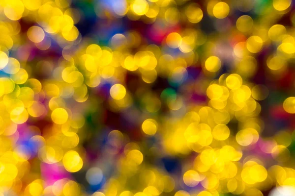 Abstract golden color lights chrismas background. de-focused - image