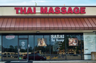 Houston, Teksas / Usa 11 / 20 / 2019: Houston, Tx 'deki Tayland Masaj Salonu. Binlerce yıl önce geliştirildiği söylenen, yoga pozisyonlarıyla aküpresi birleştiren geleneksel bir şifa sistemi..
