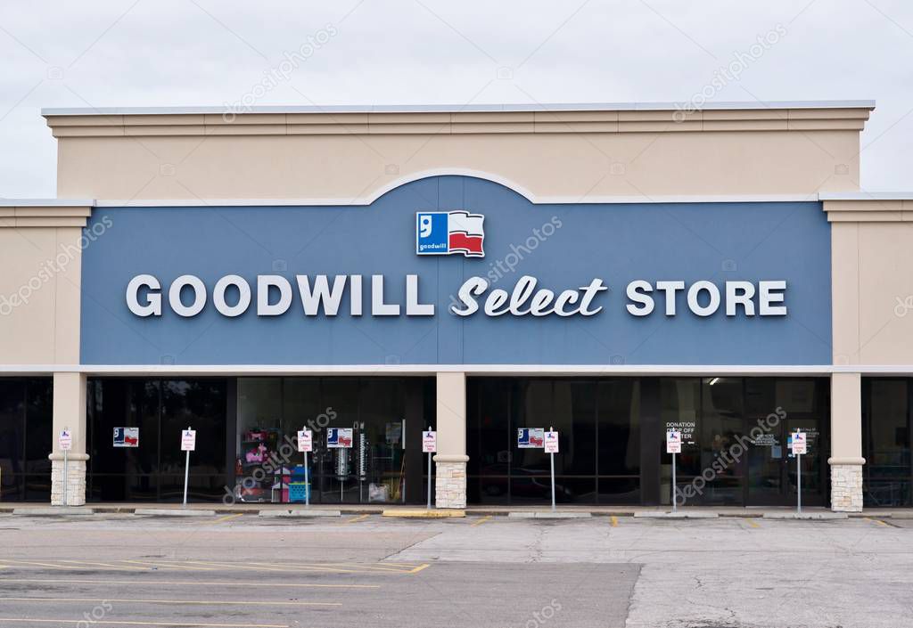 Humble, Texas/USA 11/28/2019: Goodwill store in Humble, TX. Founded in 1902 they're a nonprofit organization that provide training and job placement, funded by their thrift store chains like these.