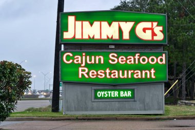 Houston, Teksas / Usa 01 / 15 / 2020: Jimmy G 'nin Cajun Deniz Ürünleri Restoranı Neon Yolu tabelası Kuzey Houston, Tx. 2012 yılında kurulmuş, JFK havaalanı yakınlarında popüler bir Cajun Creole Deniz Ürünleri restoranıdır..