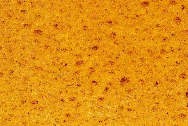 Orange Colored Cleaning Sponge Porous Surface Full Frame Plain Image — Stock Photo, Image