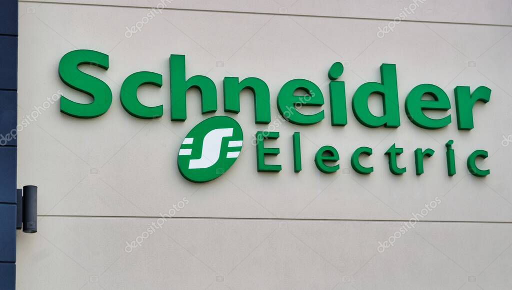 Houston, Texas/USA 03/29/2020: Schneider Electric exterior building sign on their business in Houston, TX. Developer of electrical equipment, industrial machine automation and sustainability.