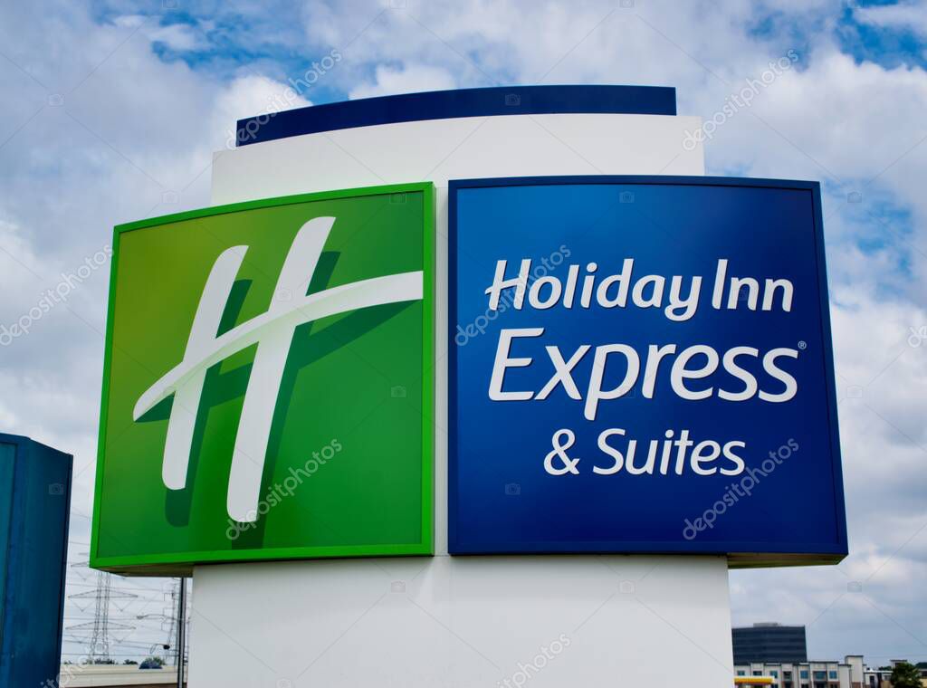 Houston, Texas/USA 04/05/2020: Holiday Inn Express road sign in Houston, TX. Motel chain with Green Engage system with eco friendly practices. Founded in 1952, it's one of the world's largest chains.