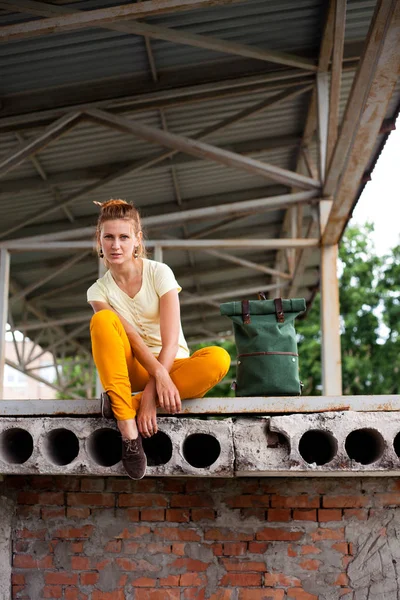 Portrait of Fashion smiling Model Girl on the Industrial Background — Stock Photo, Image